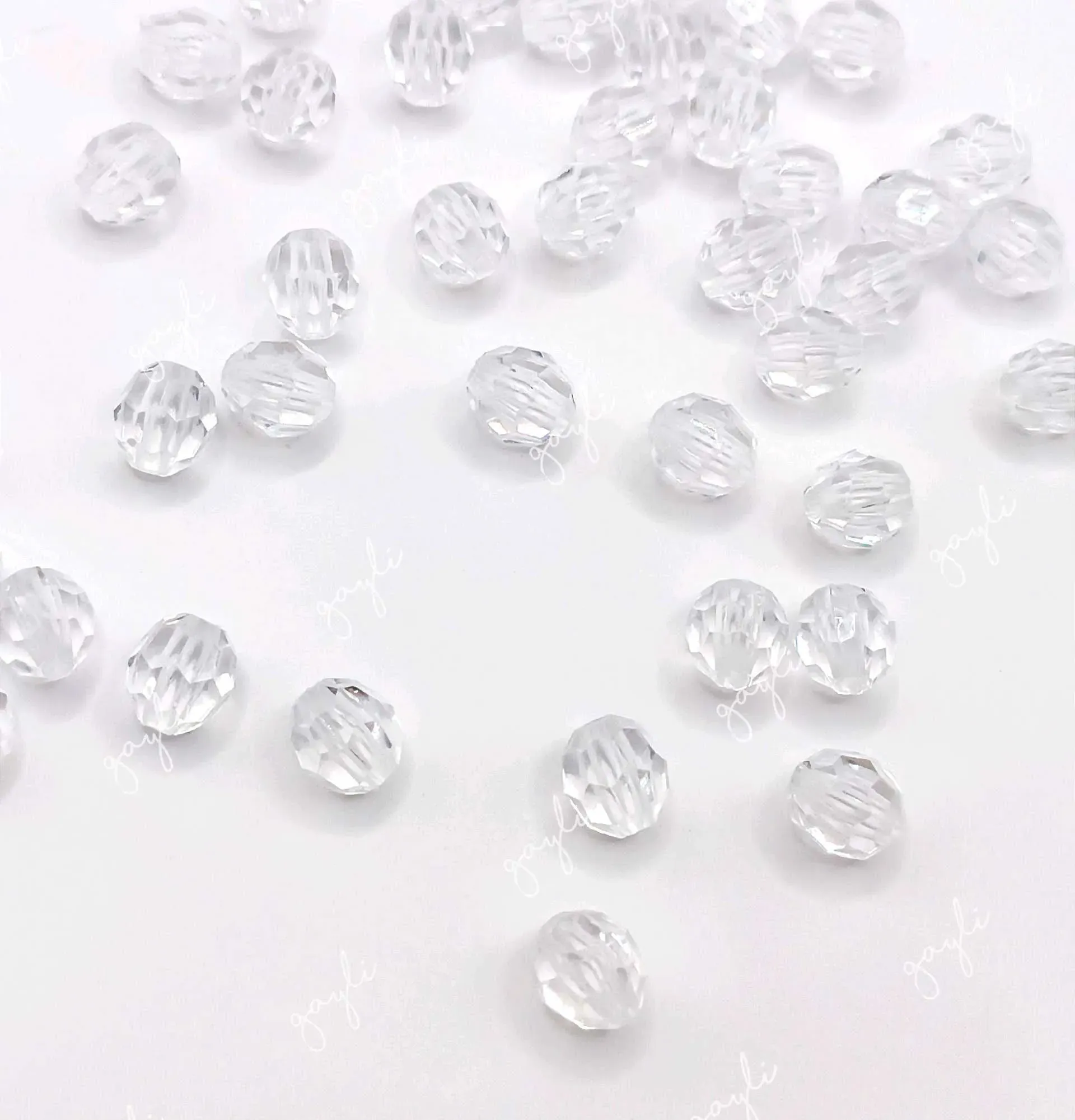 Perlas plásticas transparentes 0.9×1cm / 100 unidades