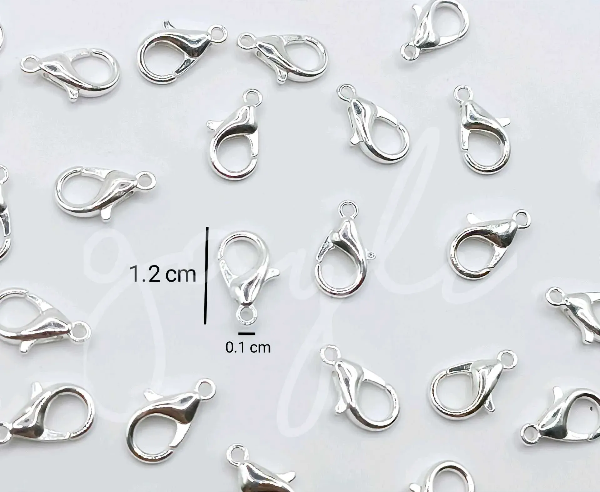 Cierre de perico plateado 1.2cm / 100 unidades