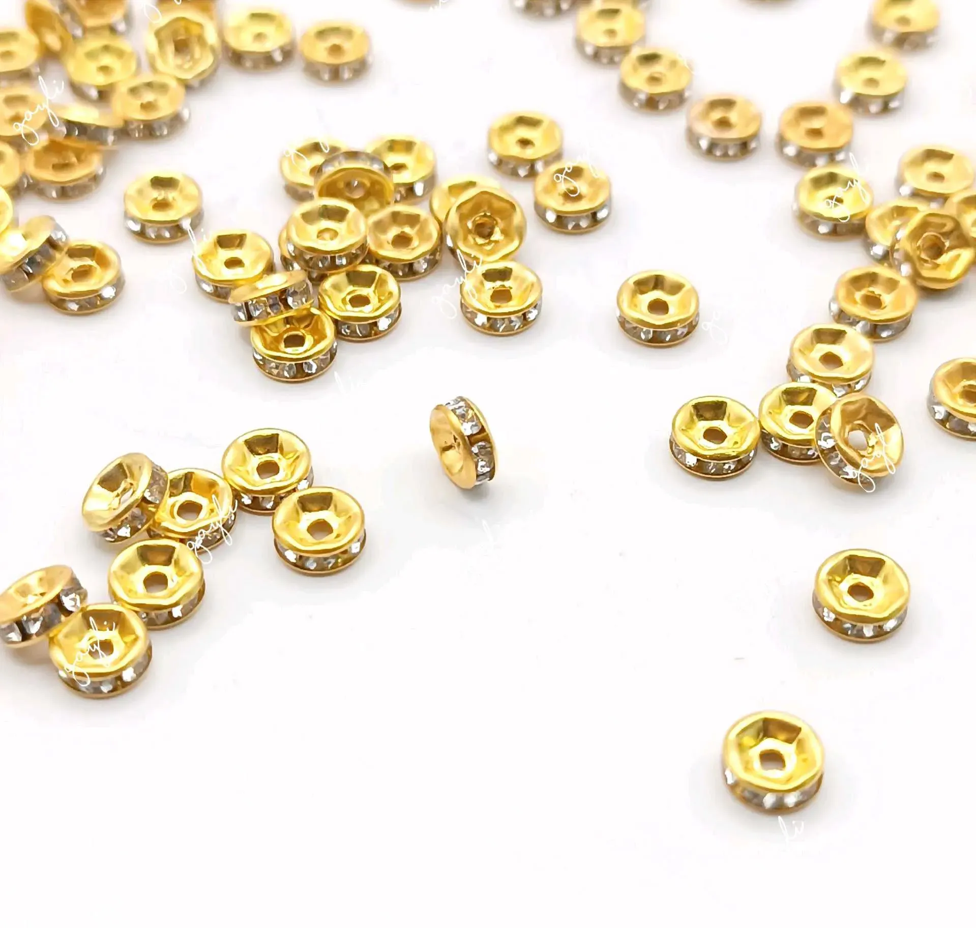 Separador rondeles dorados 8mm / 100 unidades